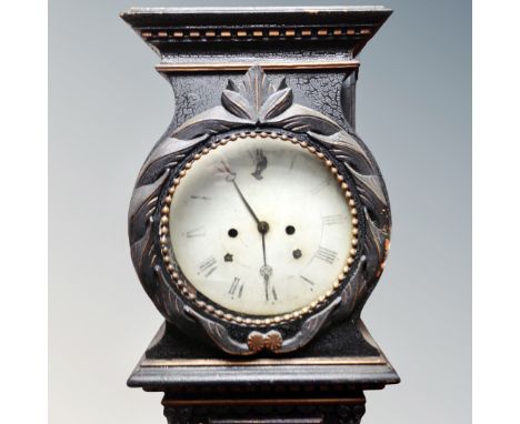 A Scandinavian painted longcase clock with circular dial, pendulum and weights.