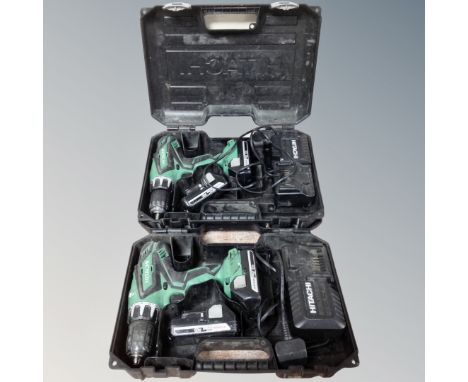 Two Hitachi cordless drills, both with batteries and chargers, cased.