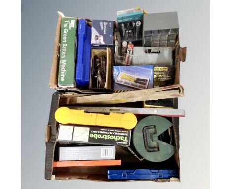 Two boxes containing tools, a socket set, timing light, spirit levels etc.