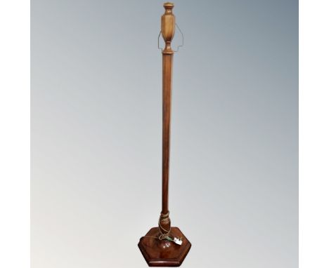 A beech Art Deco standard lamp on hexagonal base.