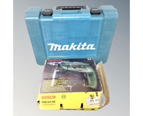 A Bosch electric drill together with a lamp and a Makita storage box.