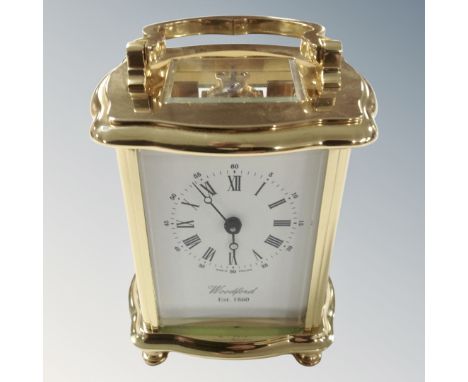 A good quality brass carriage clock by Woodford, with key.