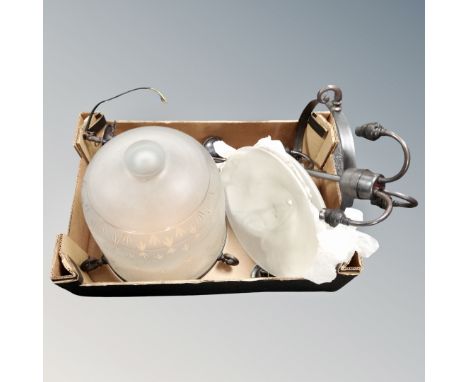 A glass light with two shades.