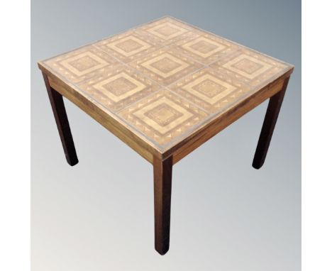 A mid-20th century Danish tile topped square lamp table.