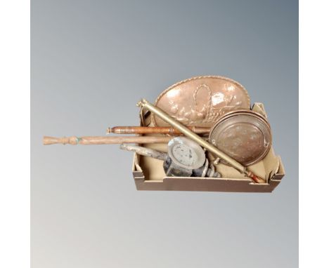 A box containing antique and later metal wares including bed warming pans, copper embossed plaque, 19th century carriage lamp