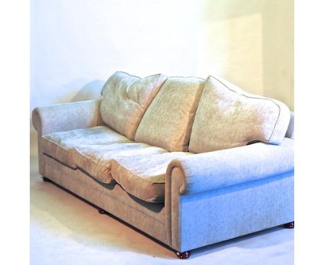 A grey upholstered three seater sofa, 264cm