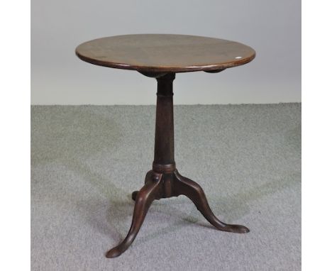 An 18th century oak occasional table, on a tripod base, 60cm