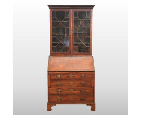 A George III mahogany bureau bookcase, on bracket feet, 92cm
