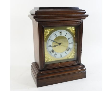 A beech cased mantel clock, with an eight day movement, 33cm high