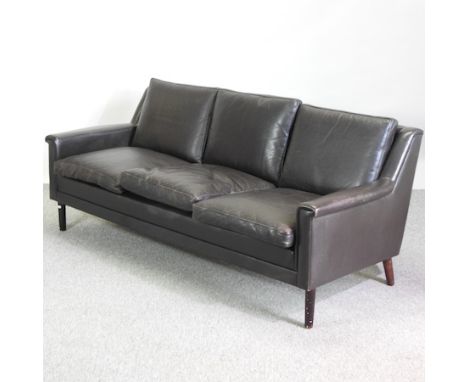 A 1960's Danish black leather upholstered three seater sofa, 184cm