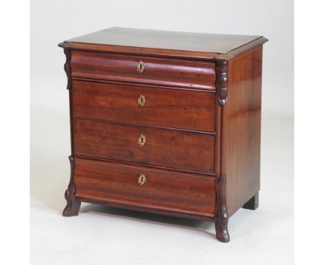 A small 18th century Dutch mahogany commode, containing four long drawers, 66cm