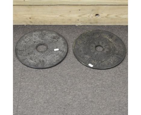 A jade coloured Pi disc, 30cm, together with another