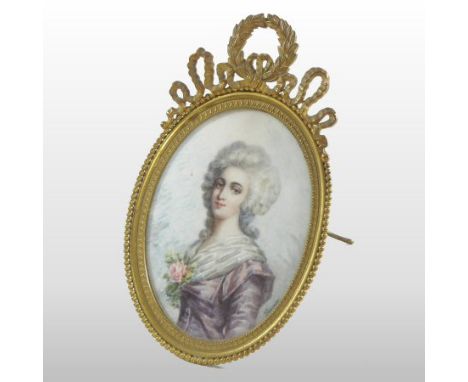 French School, early 20th century, portrait miniature of a young lady, oil on ivory, signed Hernandes, 10 x 8cm oval, in an o