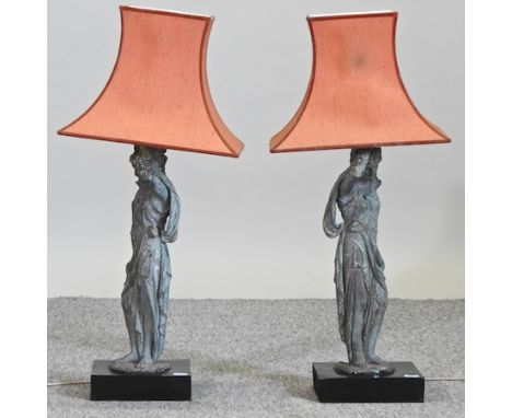 A cast metal classical figure of a lady, mounted as a table lamp, with shade, 67cm high overall, together with another simila