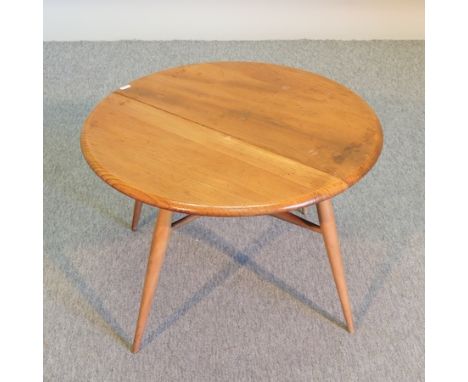 An Ercol light elm side table, with a drop leaf, 61cm