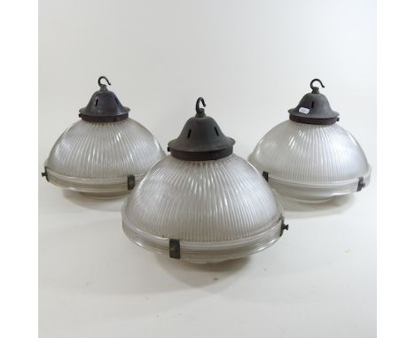 A vintage holophane style ceiling light, together with two others, 33cm