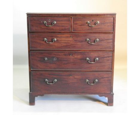 A George III mahogany chest, containing two short over three long drawers, on bracket feet, 92cm