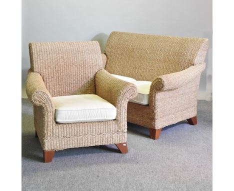 A Laura Ashley wicker conservatory suite, comprising a sofa, 168cm, and armchair