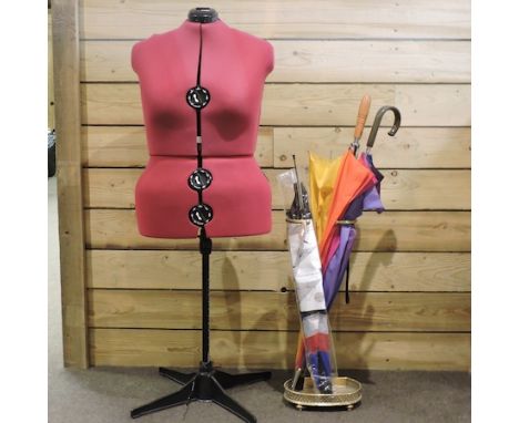 A brass stick stand, 77cm high, together with a dressmaker's mannequin