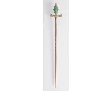 A gold sword pin with jade and diamond finial.