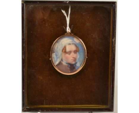 A portrait miniature 'Tender Thoughts' by Eve Baker, the back inscribed on a Newman's Soho Square label, the pendant mount po