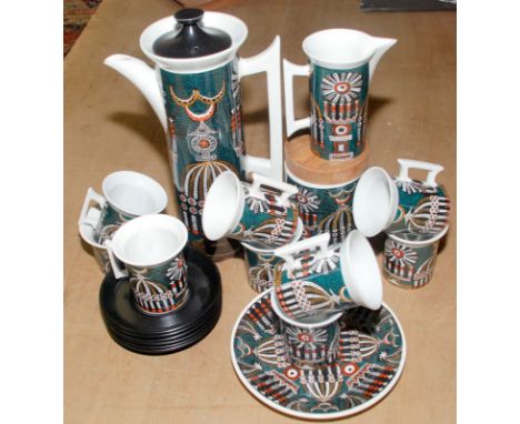 A Portmeirion 'Magic City' eleven piece coffee service including a coffee pot and eight mugs, one tea caddy and a plate. 