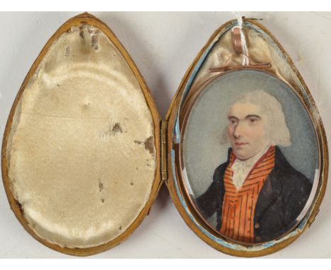 An 18th century portrait miniature of a young gentleman with striped waistcoat, 6.5 x 5cm. Shaped, fitted case.   Condition R