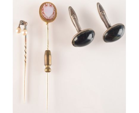 A cameo carved gold mounted hardstone stick pin, a diamond and pearl stick pin and a pair of silver cufflinks. 