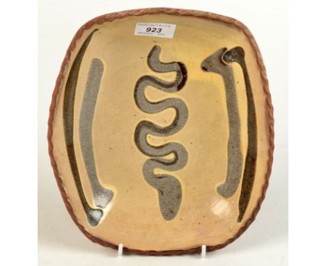 A slip decorated early Winchcombe Pottery dish, 25 x 22.3cm, impressed mark.