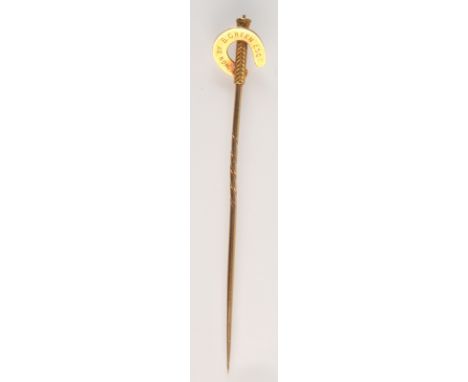 A gold Victorian presentation jockey's stick pin in the form of a whip, about the handle, a horseshoe, this is inscribed 'Won