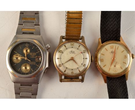 Two gentleman's wristwatches with gilt cases, together with a Tag Heuer automatic chronograph 'Titanium' wristwatch, the matt
