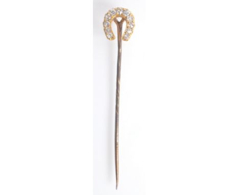 A pin the gold horseshoe finial set with diamonds, boxed. 