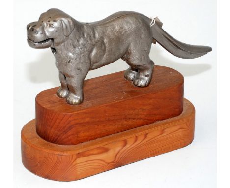 A cast iron dog nut cracker.