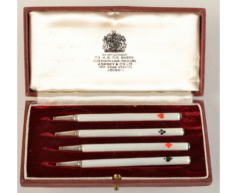 Asprey a set of four silver and enamel bridge pencils, original box.  Condition Report: Pencil with heart on is excellent.Pen