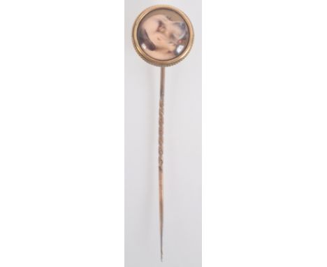 A William Bishop Ford gold stick pin, enamelled with the head of a hound, remnants of signature to the back and dated 1875, s