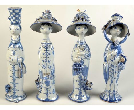 A group of four Bjorn Wiinblad Danish blue and white earthenware figures representing the seasons "Foraar", "Sommer", "Eftera
