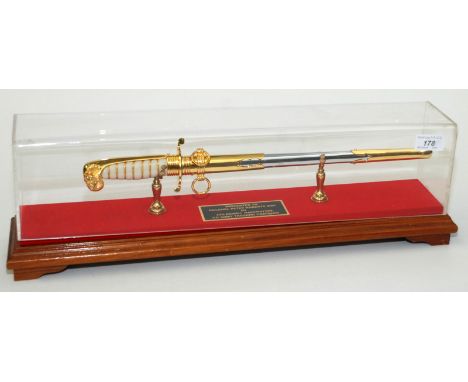 A presentation dirk inscribed to the stand "Presented to Colonel Peter Roberts MBE by L.T.G. Pairob Makchattre CG Army Traini