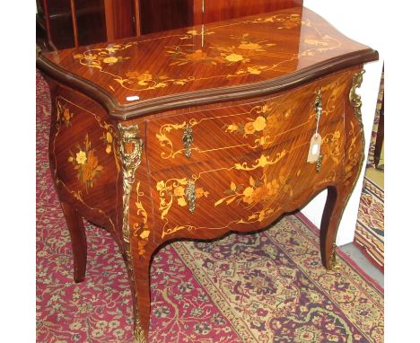 A small marquetry Bombe two drawer commode.