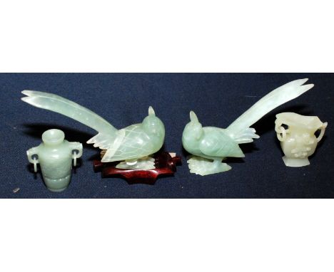 Two Chinese jade miniature archaic style vessels, the jug carved with a mythical creature, one height 5cm, the other 5.5cm, t