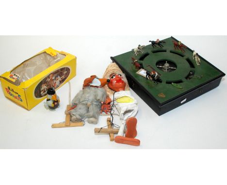 A Jaques London battery powered horse race game, together with a Pelham Wombles puppet Orinoco copyright 1973, boxed and one 