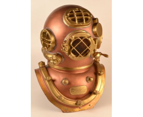 A full scale fibreglass reproduction of an A. Schrader & Son Inc. Mk V US Navy Standard diving helmet with static fixtures, h