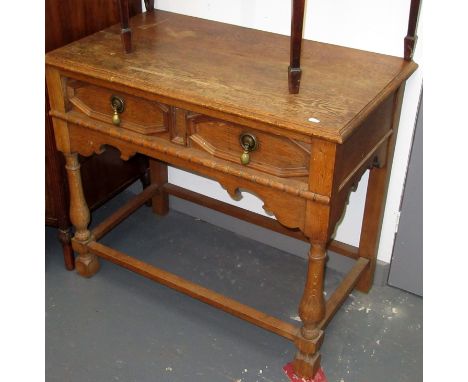 A light oak side table fitted with a single drawer in 17th century style.