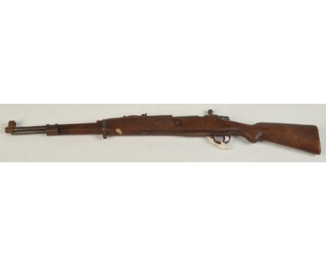 A reduced scale model of a rifle.