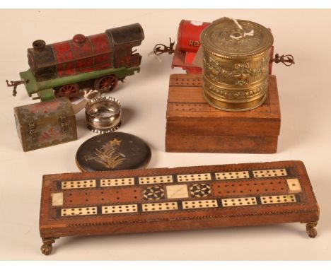 A Hornby 0 guage clockwork locomotive and an 0 guage 'Royal Daylight Oil' wagon, together with cribbage boards etc.