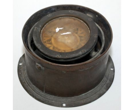 A ship's brass compass in a binnacle mount by H. & W., Southampton, diameter 13.5cm.
