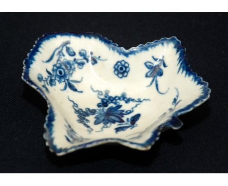 An 18th century Worcester leaf shaped pickle dish with blue painted decoration, open crescent mark.