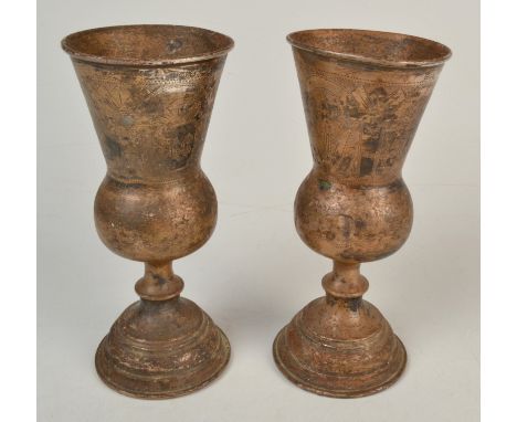 A pair of Russian St Petersburg silver Kiddush cups with thistle shape bowls, these engraved with architectural views, height
