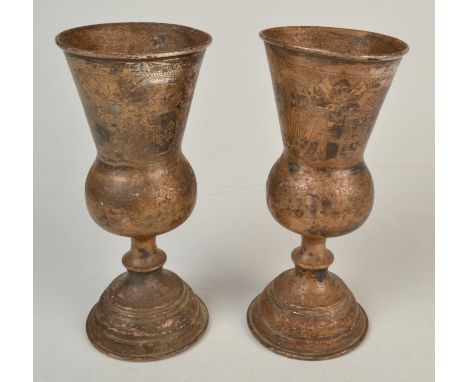 A pair of Russian St Petersburg silver Kiddush cups with thistle shape bowls, these engraved with architectural views, height