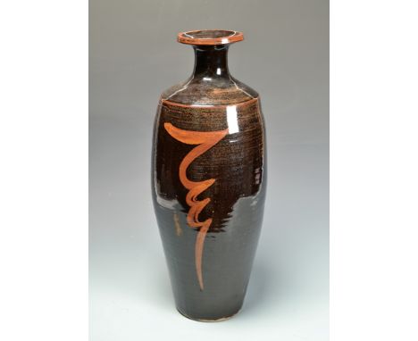 A stoneware vase with rust ilmenite brush decoration on Tenmoku glaze 53.8cm, Note: this vase was given by David Leach for th