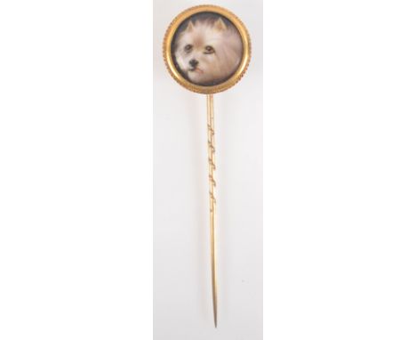 A John William Bailey gold stick pin, the finial with a painted enamel terrier signed to the back J.W.E. Bailey, diameter 1.5